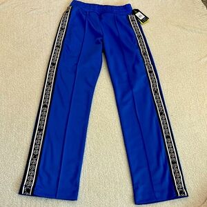 Zumba Varsity Tear-Away Track Pants in blue. Brand new Women’s size XS